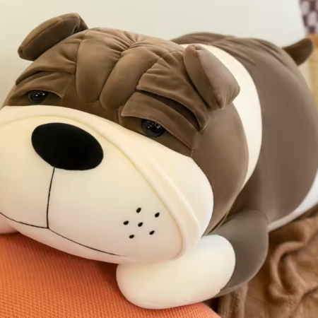 Perro peluche/almohada marrón oscuro