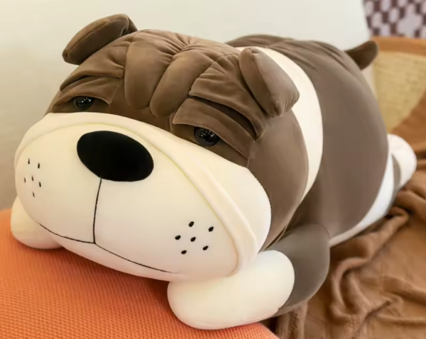 Perro peluche/almohada marrón oscuro